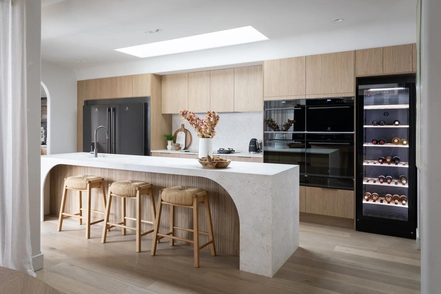 Curved Kitchen Islands and Softer Architectural Details